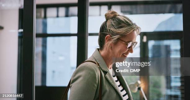 office, mature and woman with smile, walking and ceo of real estate company, corporate and business. boss, entrepreneur and female person with happiness for startup, work and pride for career or job - confident woman walking side view stock pictures, royalty-free photos & images