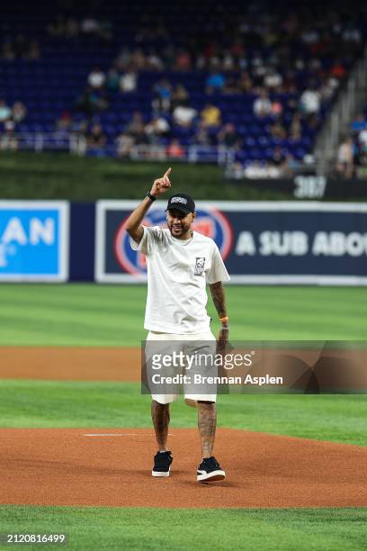 Neymar Jr throws the first pitch during the Miami Marlins against the Pittsburgh Pirates on Opening Day at loanDepot park on March 28, 2024 in Miami,...