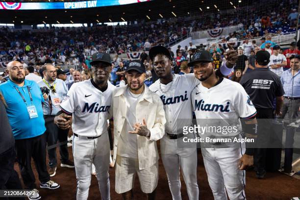 Nick Gordon of the Miami Marlins, Neymar Jr, Jazz Chisholm Jr. #2 of the Miami Marlins and Luis Arraez of the Miami Marlins pose before the game...