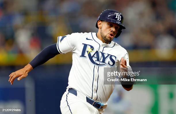 Rene Pinto of the Tampa Bay Rays scores a run in the sixth inning during the Opening Day game against the Toronto Blue Jays at Tropicana Field on...
