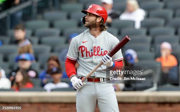 Bryce Harper of the Philadelphia Phillies in action against the New York Mets at Citi Field on September 30, 2023 in New York City. The Mets defeated...