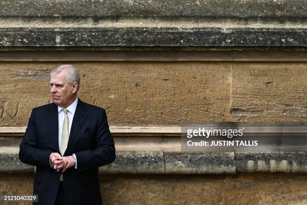 Britain's Prince Andrew, Duke of York reacts as he arrives at St. George's Chapel, Windsor Castle, to attend the Easter Mattins Service, on March 31,...