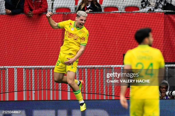 Nantes' French forward Matthis Abline celebrates scoring his team's first goal during the French L1 football match between OGC Nice and FC Nantes at...