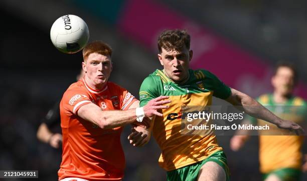 Dublin , Ireland - 31 March 2024; Ciarán Mackin of Armagh in action against Shane O'Donnell of Donegal during the Allianz Football League Division 2...