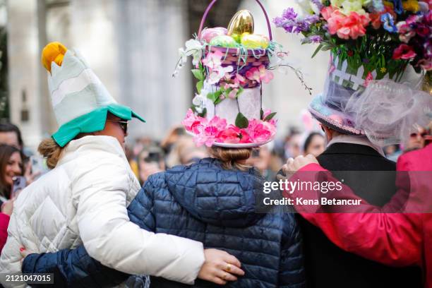 People participate in the Easter parade near Saint Patrick's Cathedral on March 31, 2024 in New York City. Every year people gather on Fifth Avenue...