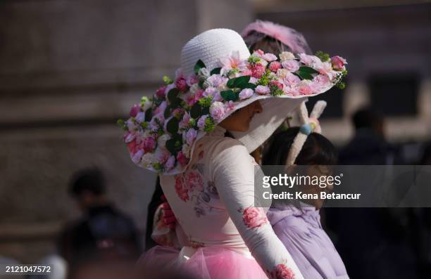 People participate in the Easter parade outside Saint Patrick's Cathedral on March 31, 2024 in New York City. Every year people gather on Fifth...