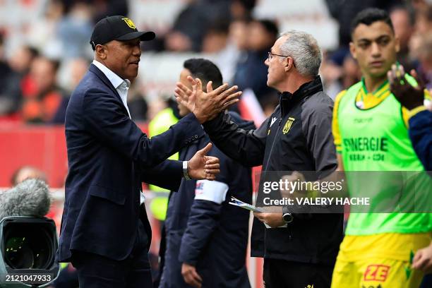 Nantes' French head coach Antoine Kombouare celebrates at the end of the French L1 football match between OGC Nice and FC Nantes at the Allianz...