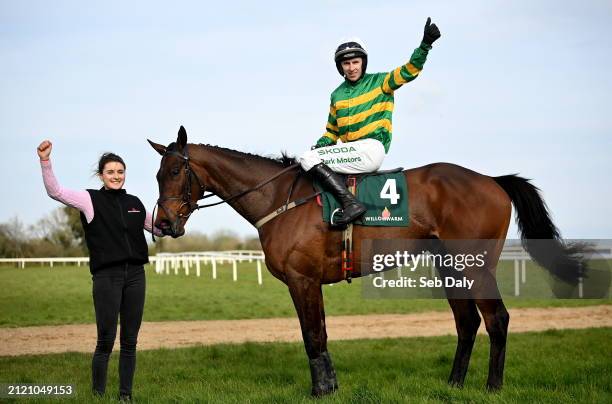 Meath , Ireland - 31 March 2024; Jockey Mark Walsh celebrates on Spillane's Tower after winning the WillowWarm Gold Cup on day two of the Fairyhouse...