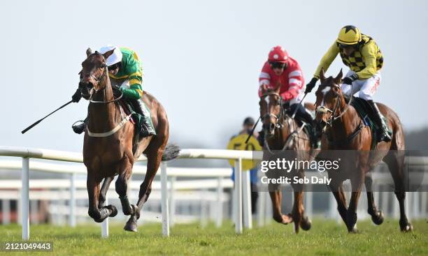 Meath , Ireland - 31 March 2024; Spillane's Tower, left, with Mark Walsh up, on their way to winning the WillowWarm Gold Cup, from eventual second...