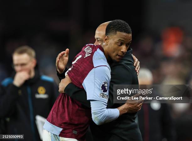 Aston Villa's Ezri Konsa hugs a colleague at the end of the match during the Premier League match between Aston Villa and Wolverhampton Wanderers at...