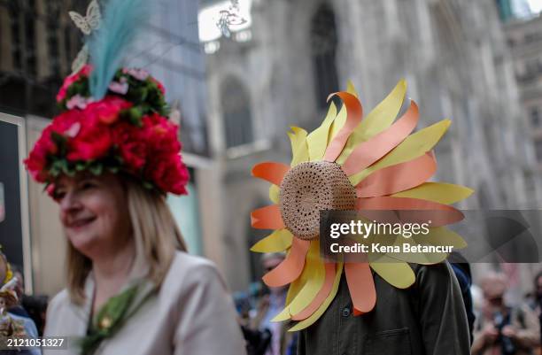 People participate in the Easter parade outside Saint Patrick's Cathedral on March 31, 2024 in New York City. Every year people gather on Fifth...