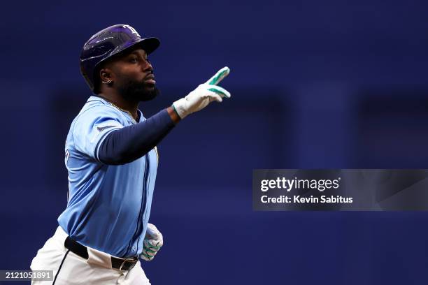 Randy Arozarena of the Tampa Bay Rays celebrates after hitting a solo home run during the first inning against the Toronto Blue Jays at Tropicana...