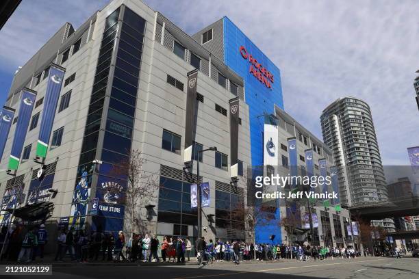 Fans line up outside Rogers Arena before the NHL game between the Anaheim Ducks and the Vancouver Canucks on March 31, 2024 in Vancouver, British...