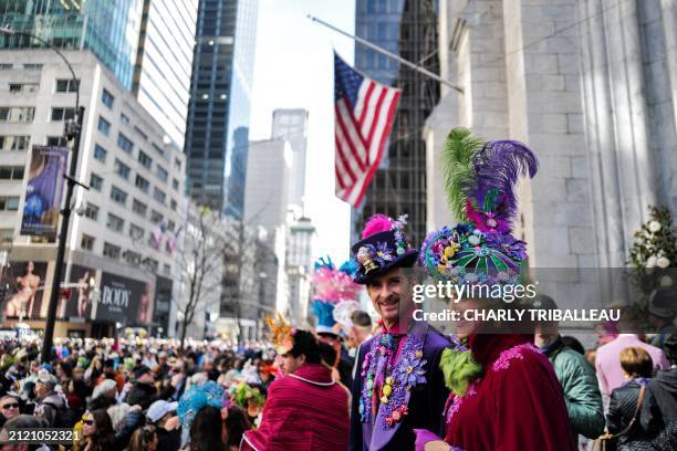 People attend the annual Easter Parade and Bonnet Festival on Fifth Avenue in front of St. Patrick's Cathedral in New York on March 31, 2024.