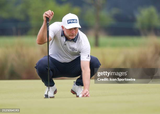 David Skinns sets up his putt on 1 green during the final round of the PGA Texas Children's Houston Open at Memorial Park Golf Course on March 31,...