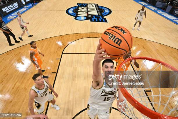 Zach Edey of the Purdue Boilermakers shoots in the second half against the Tennessee Volunteers during the Elite Eight round of the 2024 NCAA Men's...