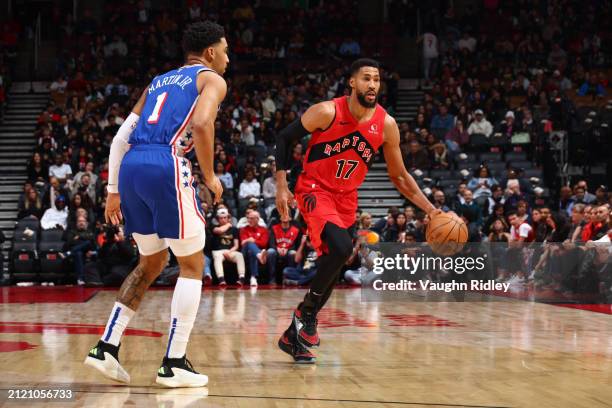 Garrett Temple of the Toronto Raptors dribbles the ball during the game against the Philadelphia 76ers on March 31, 2024 at the Scotiabank Arena in...