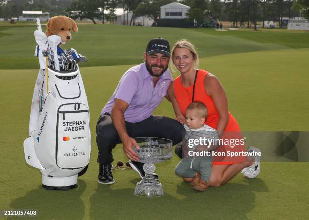 Tournament winner Stephan Jaeger , wife Shelby and son Fritz pose with trophy during the final round of the PGA Texas Children's Houston Open at...