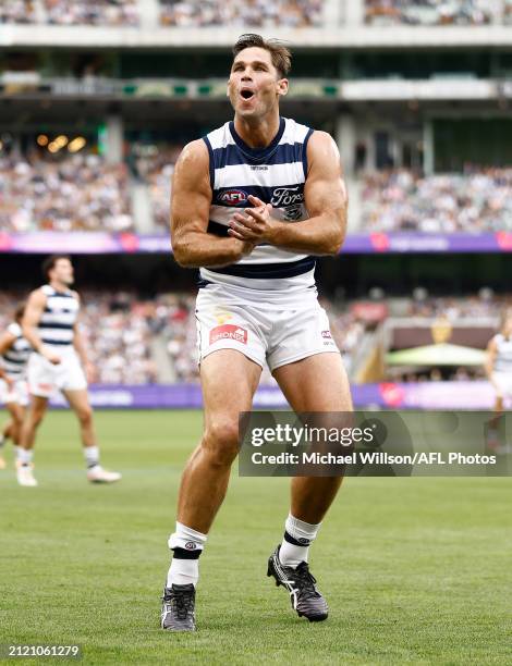 Tom Hawkins of the Cats celebrates a goal in his 350th match during the 2024 AFL Round 03 match between the Hawthorn Hawks and the Geelong Cats at...