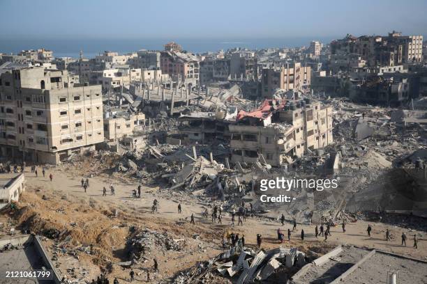 General view shows the destruction in the area surrounding Gaza's Al-Shifa hospital after the Israeli military withdrew from the complex housing the...
