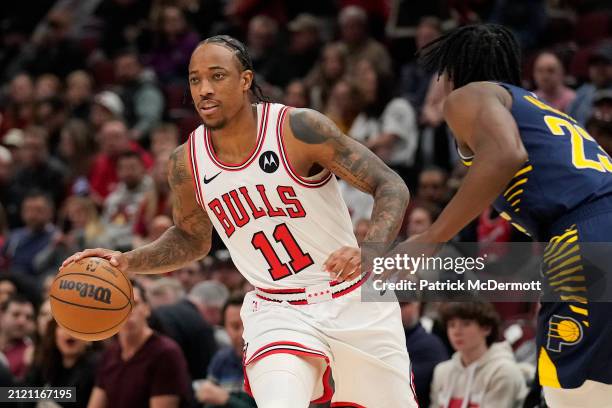 DeMar DeRozan of the Chicago Bulls dribbles the ball during the first half against the Indiana Pacers at the United Center on March 27, 2024 in...