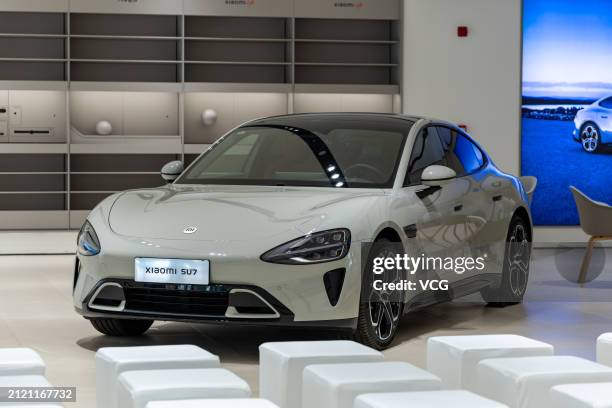 Xiaomi's new energy vehicle SU7 is displayed at Xiaomi delivery center on March 28, 2024 in Shenzhen, Guangdong Province of China. The Xiaomi SU7 was...