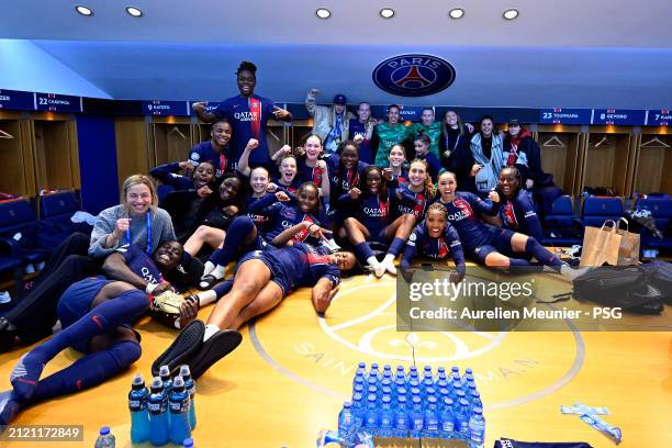 Paris, Saint-Germain players celebrate victory in the locker room after the UEFA Women's Champions League 2023/24 Quarter Final Leg Two match between...
