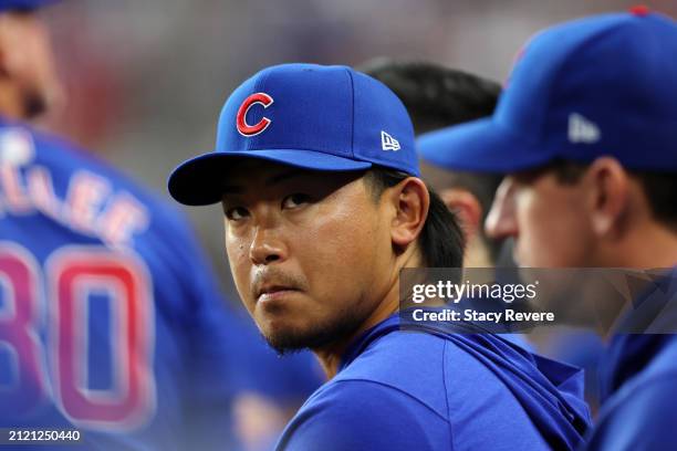 Shota Imanaga of the Chicago Cubs watches action during the fourth inning of the Opening Day game against the Texas Rangers at Globe Life Field on...