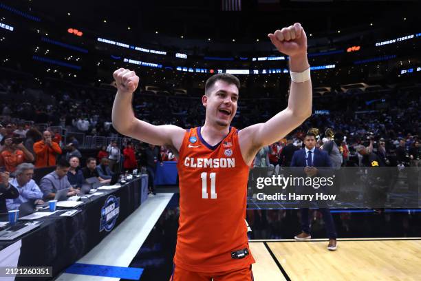 Joseph Girard III of the Clemson Tigers celebrates after defeating the Arizona Wildcats during the second half in the Sweet 16 round of the NCAA...