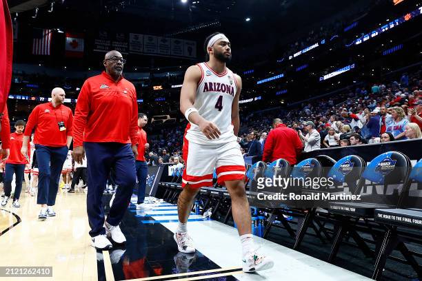 Kylan Boswell of the Arizona Wildcats reacts as he walks off the court after losing to the Clemson Tigers during the second half in the Sweet 16...