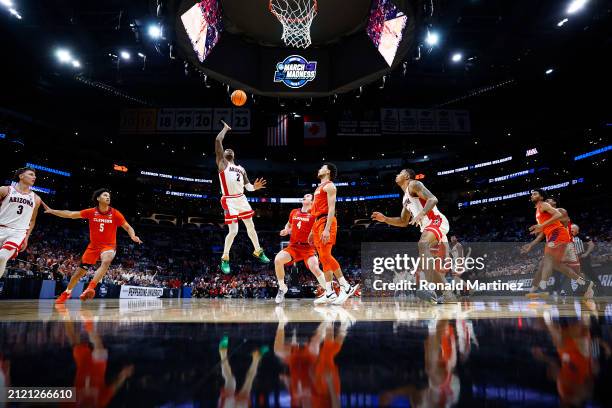 Caleb Love of the Arizona Wildcats shoots against the Clemson Tigers during the second half in the Sweet 16 round of the NCAA Men's Basketball...