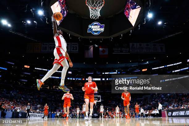 Jaden Bradley of the Arizona Wildcats dunks against the Clemson Tigers during the second half in the Sweet 16 round of the NCAA Men's Basketball...