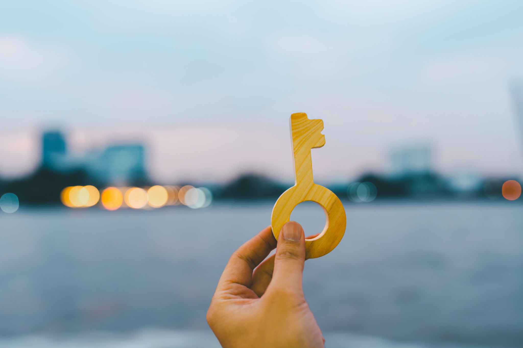 Businessman holding key model. Key of Success business concept. businessman looking forward. Businessman holding key model. Key of Success business concept. businessman looking forward.