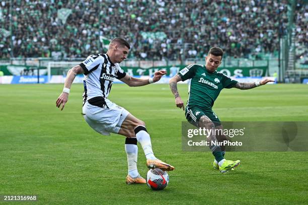 Kiril Despodov of PAOK FC is competing with Bernard of Panathinaikos FC during the Greek Super League Play Off match between Panathinaikos FC and...