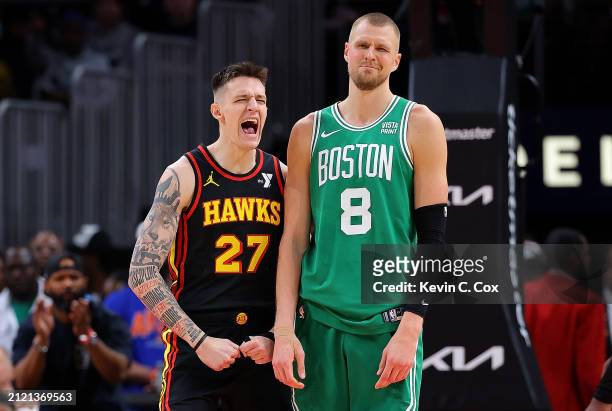 Vit Krejci of the Atlanta Hawks reacts after drawing an offensive foul from Kristaps Porzingis of the Boston Celtics during third quarter at State...