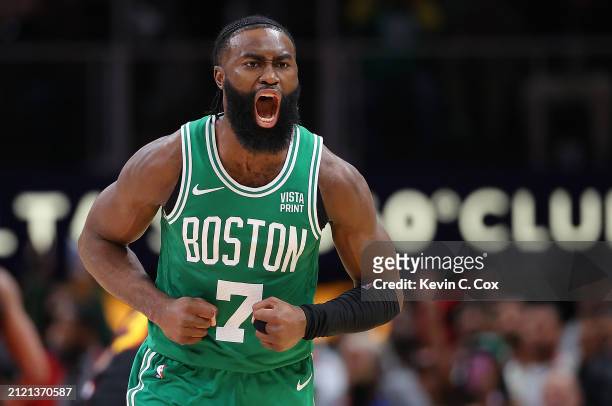 Jaylen Brown of the Boston Celtics reacts after scoring a go-ahead basket in the final seconds against the Atlanta Hawks during overtime at State...