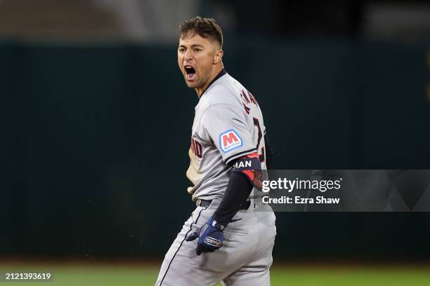Tyler Freeman of the Cleveland Guardians reacts after he hit a double that scored a run against the Oakland Athletics in the second inning at Oakland...