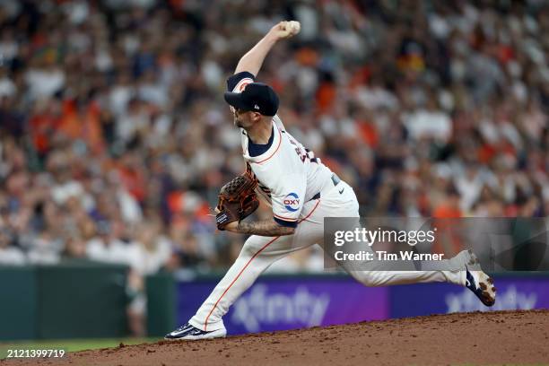 Ryan Pressly of the Houston Astros pitches in the seventh inning against the New York Yankees during Opening Day at Minute Maid Park on March 28,...