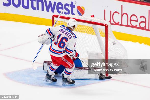 Vincent Trocheck of the New York Rangers scores the game-winning shootout goal against the Colorado Avalanche at Ball Arena on March 28, 2024 in...