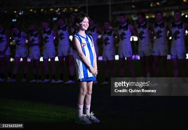 Good Friday SuperClash ambassador Imogen Mulgrew looks on during the round three AFL match between North Melbourne Kangaroos and Carlton Blues at...