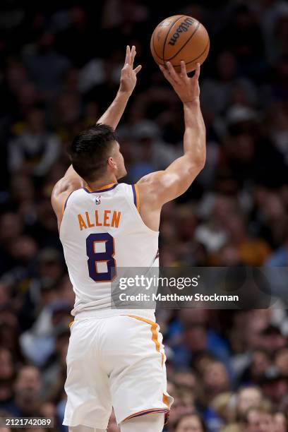 Grayson Allen of the Phoenix Suns puts up a shot against the Denver Nuggets during the third quarter at Ball Arena on March 27, 2024 in Denver,...