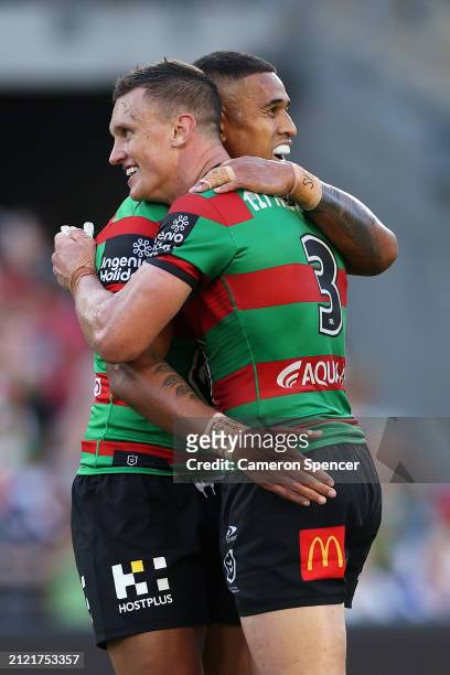 Jack Wighton of the Rabbitohs and Michael Chee Kam of the Rabbitohs celebrate winning the round four NRL match between South Sydney Rabbitohs and...
