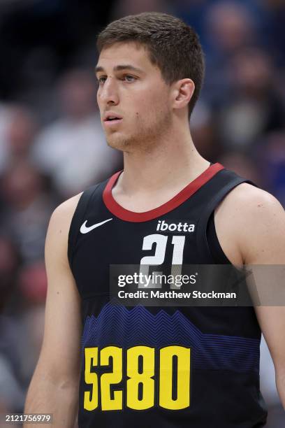 Collin Gillespie of the Denver Nuggets plays the Phoenix Suns during the third quarter at Ball Arena on March 27, 2024 in Denver, Colorado. NOTE TO...