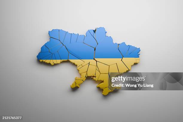 cracked ukraine map and flag - ukraine stock pictures, royalty-free photos & images