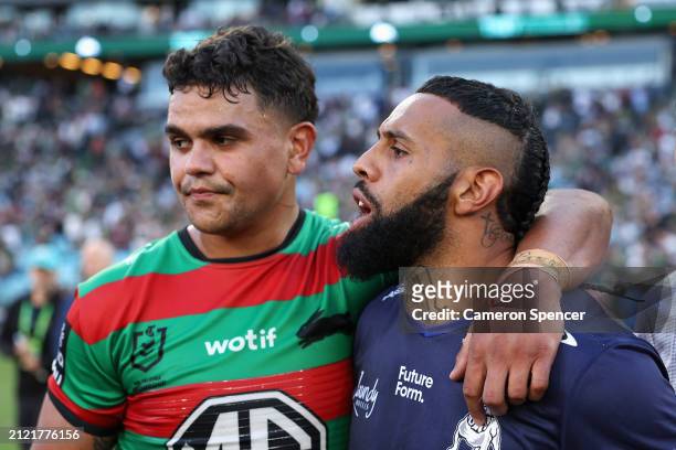 Latrell Mitchell of the Rabbitohs and Josh Addo-Carr of the Bulldogs embrace following the round four NRL match between South Sydney Rabbitohs and...