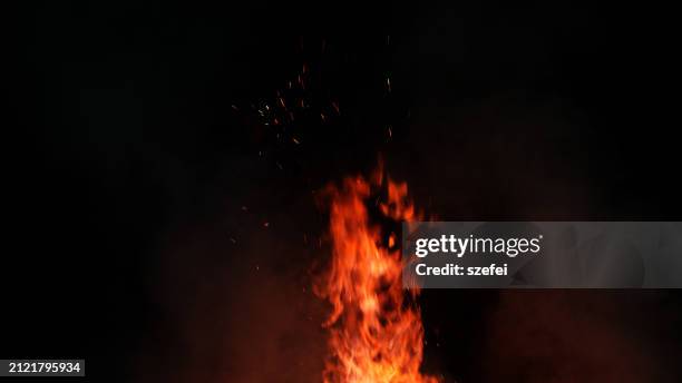 fire burning at night - ember stock pictures, royalty-free photos & images