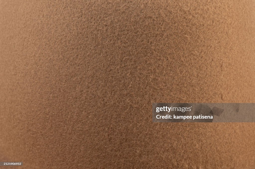 A brown surface with a lot of texture