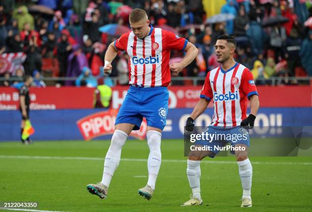 Artem Dovbyk and Yan Couto are celebrating during the match between Girona FC and Real Betis Balompie, corresponding to week 30 of LaLiga EA Sports,...