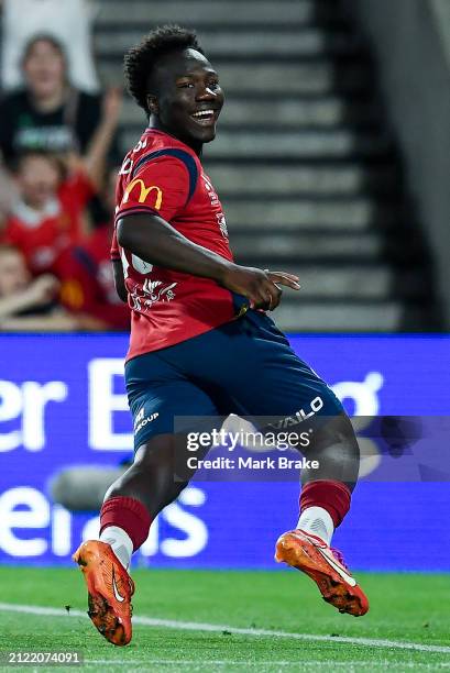 Nestory Irankunda of Adelaide United celebrates after scoring his teams second goal during the A-League Mens round 22 match between Adelaide United...