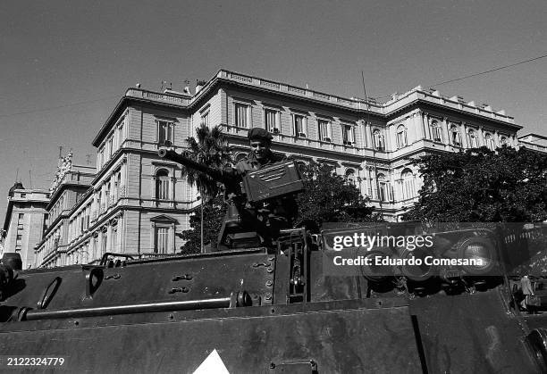 View of an Argentine Army tank stationed in front of Government House during a military coup, Buenos Aires, Argentina, March 24, 1976. The coup...